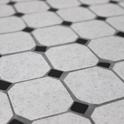 ANXO - tavolo con piano rotondo e mosaico beige e antracite